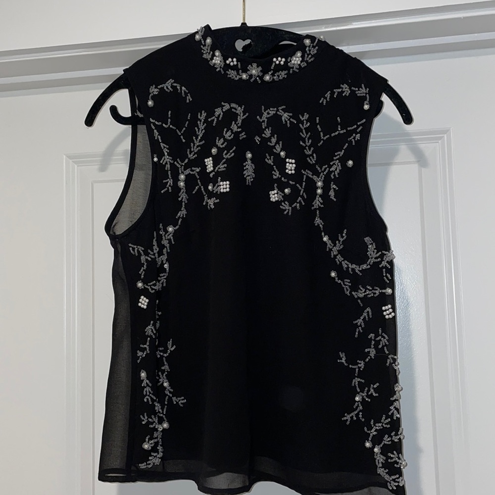 Embroidered black high neck top from Forever 21